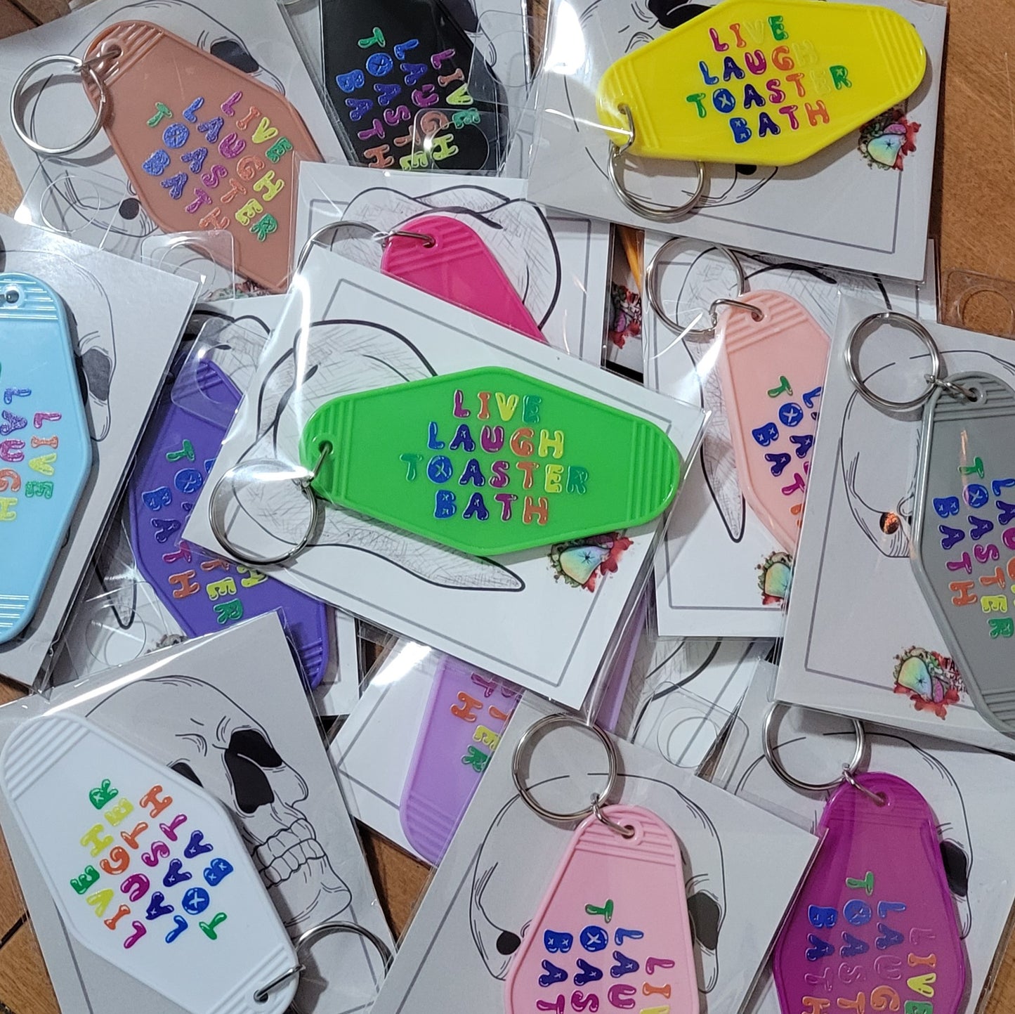 Live Laugh Toaster Bath hotel keychain